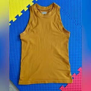 Athleta Renew Seamless Racerback Tank in Tuscan
Gold Size Small